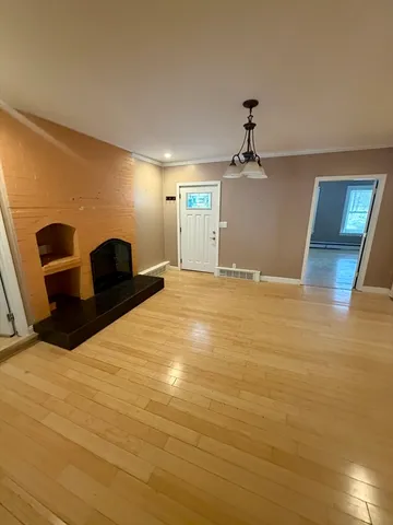 a view of a livingroom with a fireplace