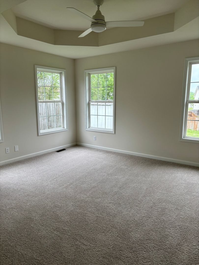 2863 Rome Lane Clarksville, TN 37040 - Photo 10 of 20 an empty room with a empty space and windows