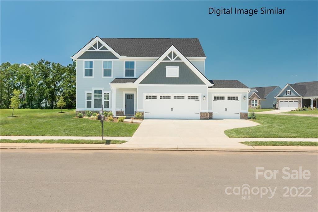 3032 Ballester Road, Unit 250 Indian Land, SC 29707 - Photo 1 of 18 a front view of a house with a yard