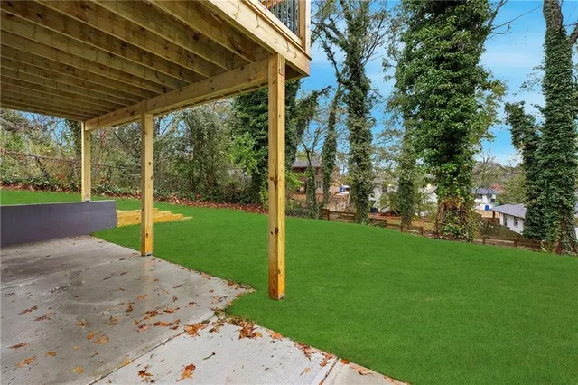 a view of a backyard with a garden and plants