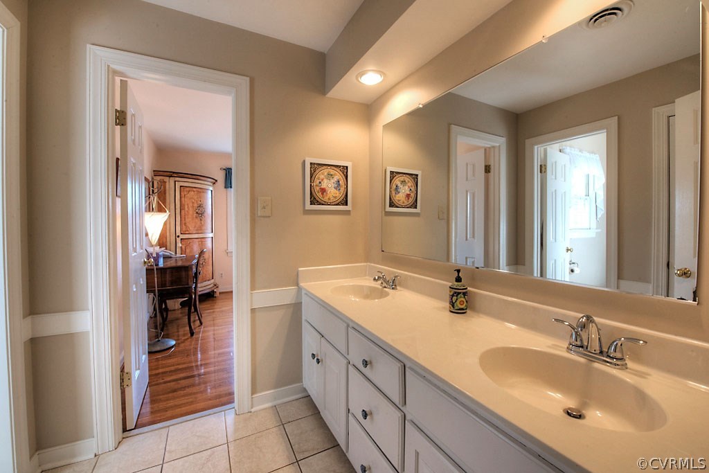 2402 Viburg Court Midlothian, VA 23113 - Photo 38 of 50 a spacious bathroom with a sink and a mirror