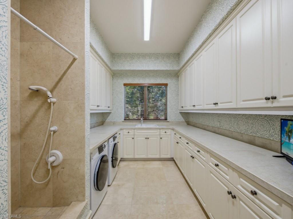 16029 Trebbio Way Naples, FL 34110 - Photo 26 of 50 Laundry - Storage Room
