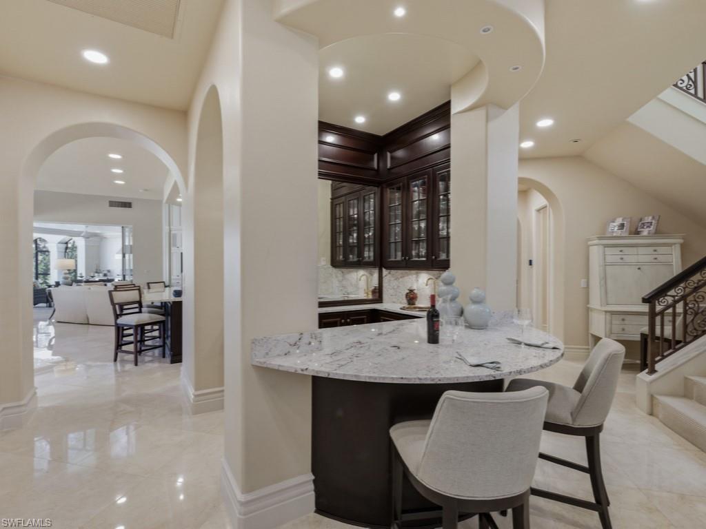 16029 Trebbio Way Naples, FL 34110 - Photo 8 of 50 Full Wet Bar w/ Wine Storage