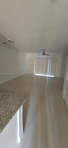 a bathroom with a toilet and a bathtub