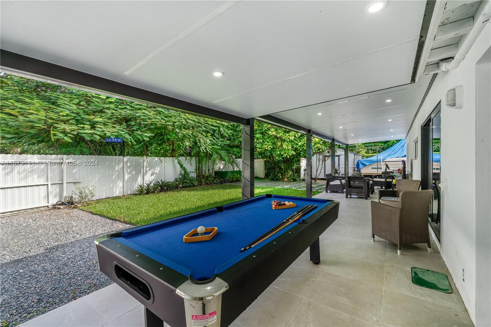 6101 Southwest 44th Terrace Miami, FL 33155 - Photo 20 of 24 a room with pool table and sofas