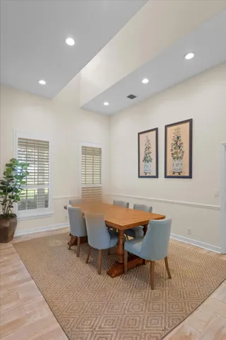 a view of living room with granite countertop furniture and a flat screen tv