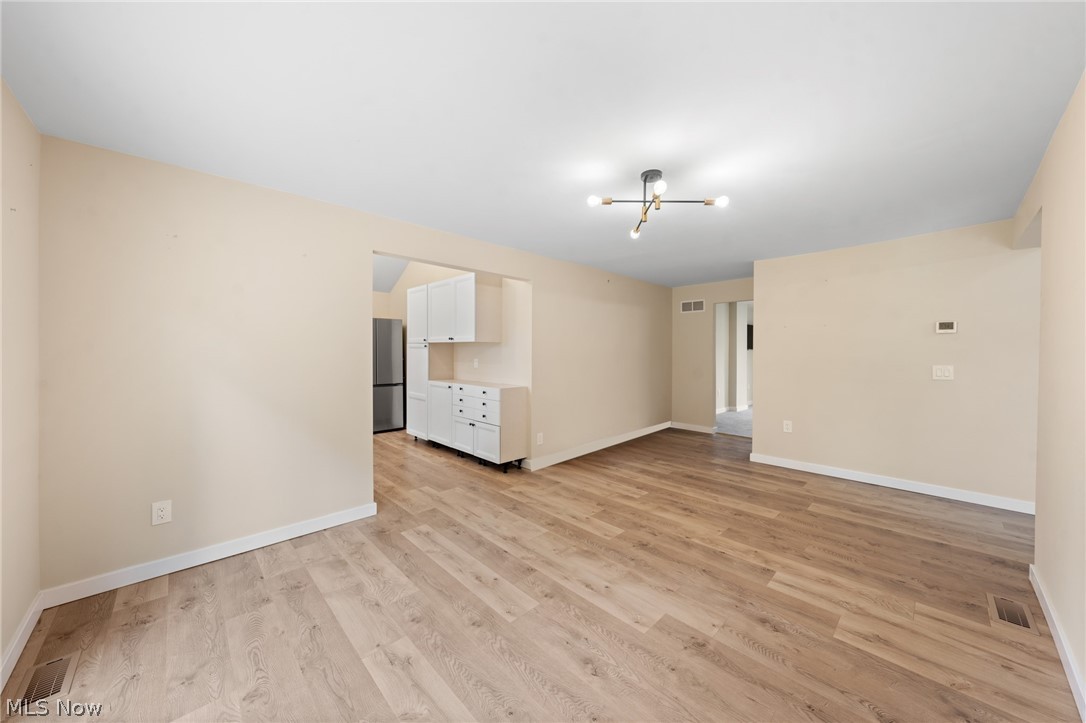 1617 Graham Road Stow, OH 44224 - Photo 25 of 49 Unfurnished living room with light wood-type flooring