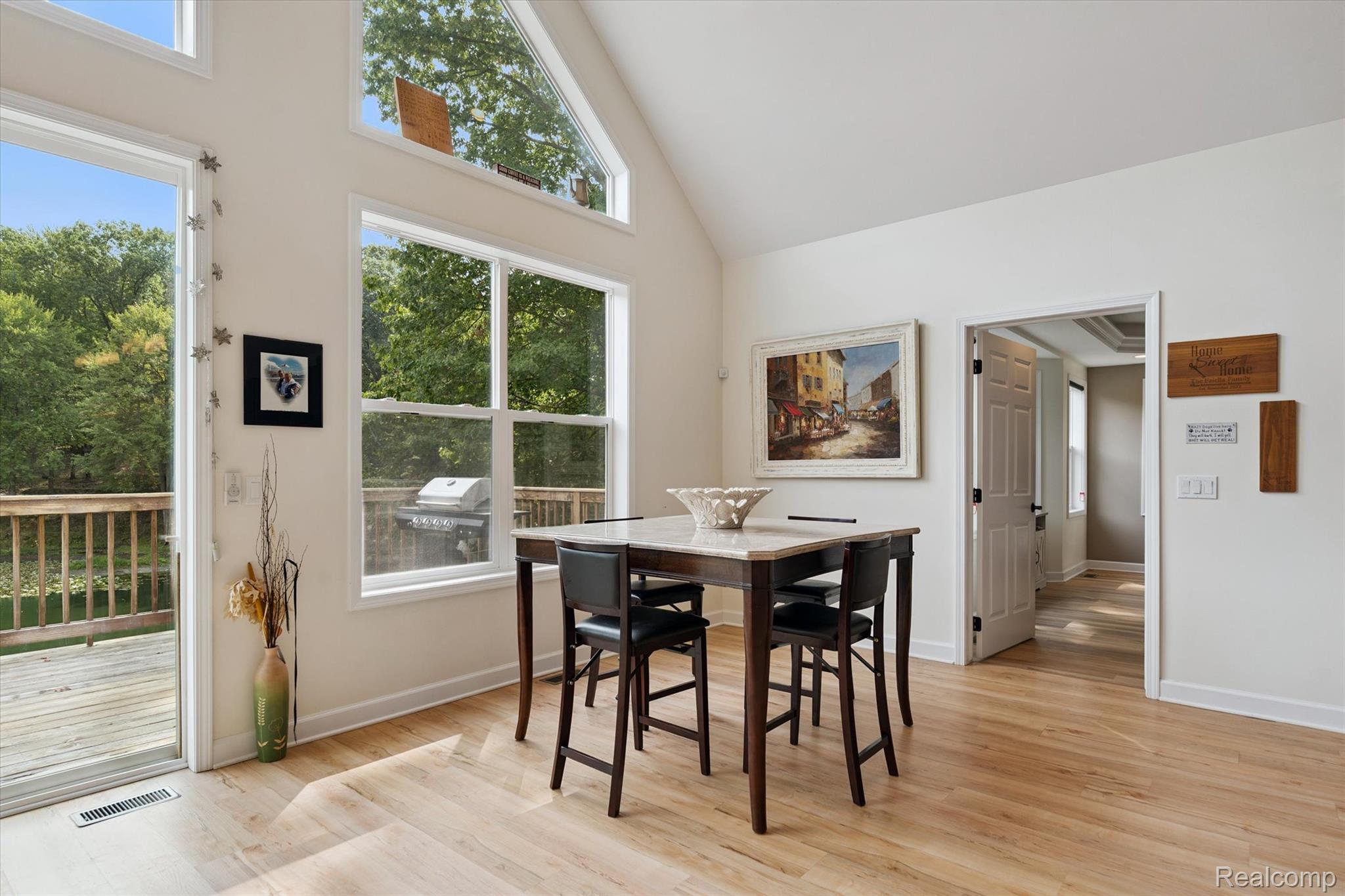 441 West Dryden Road Metamora, MI 48455 - Photo 22 of 62 Dining room featuring light wood-type flooring and high vaulted ceiling