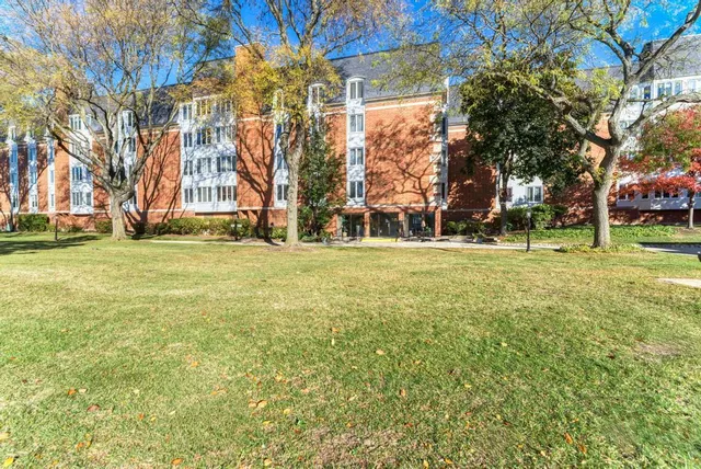 a building with trees in the background