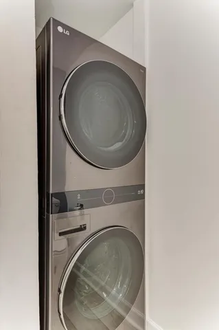 a lake view with a building in the background