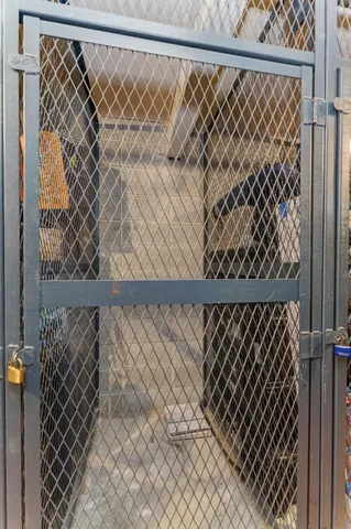 a view of a living room and kitchen