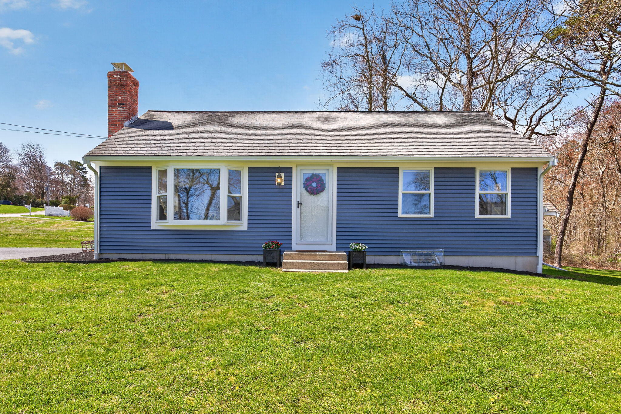 28 Chipman Road Sandwich, MA 02563 - Photo 37 of 46 a view of a house with a yard