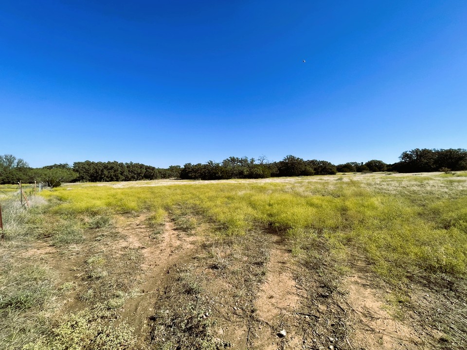 1276 Fm 574 Street West Mullin, TX 76864 - Photo 26 of 40 a view of a lake with a city