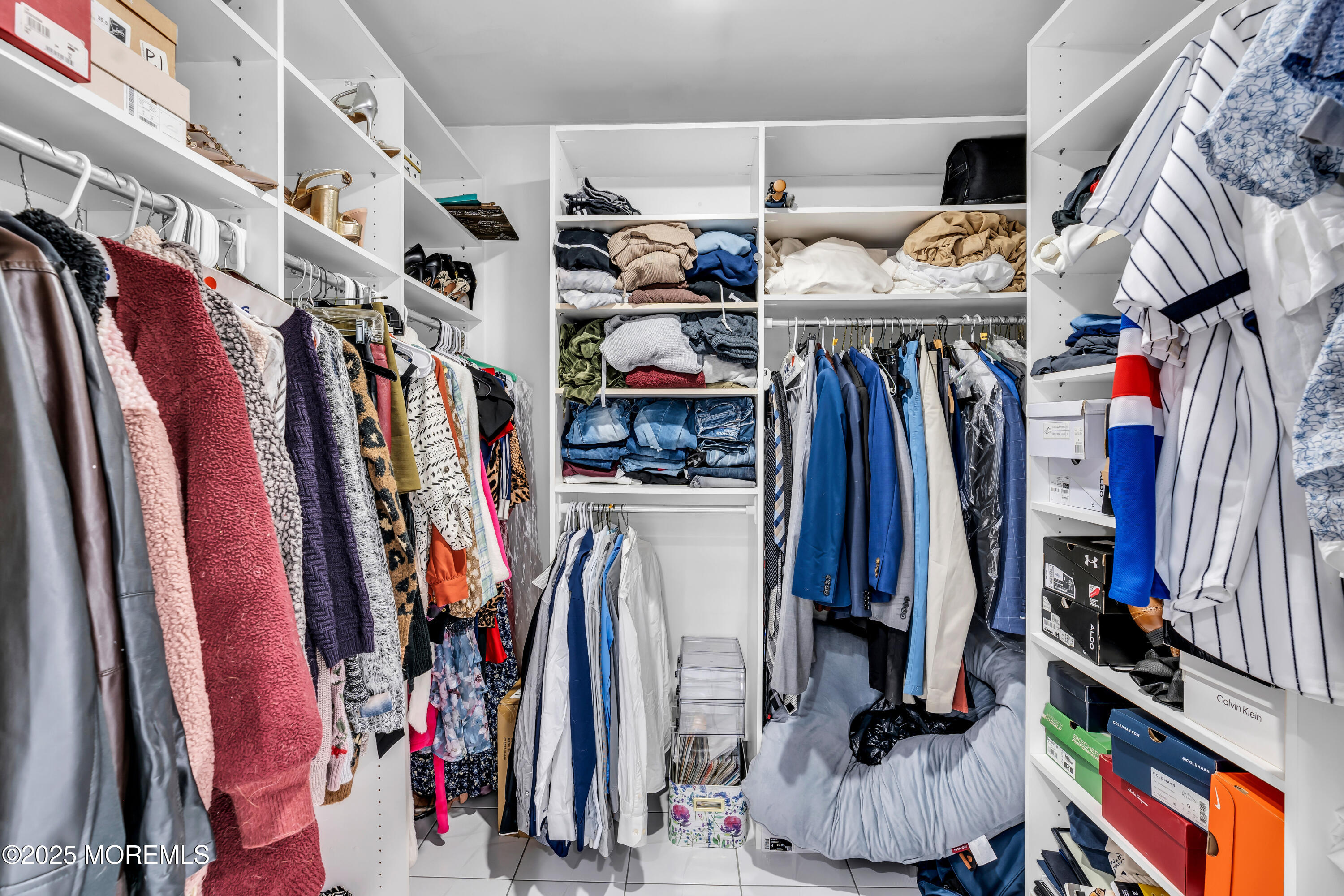 15 Windsor Road Howell, NJ 07731 - Photo 23 of 46 a view of walk in closet with clothes
