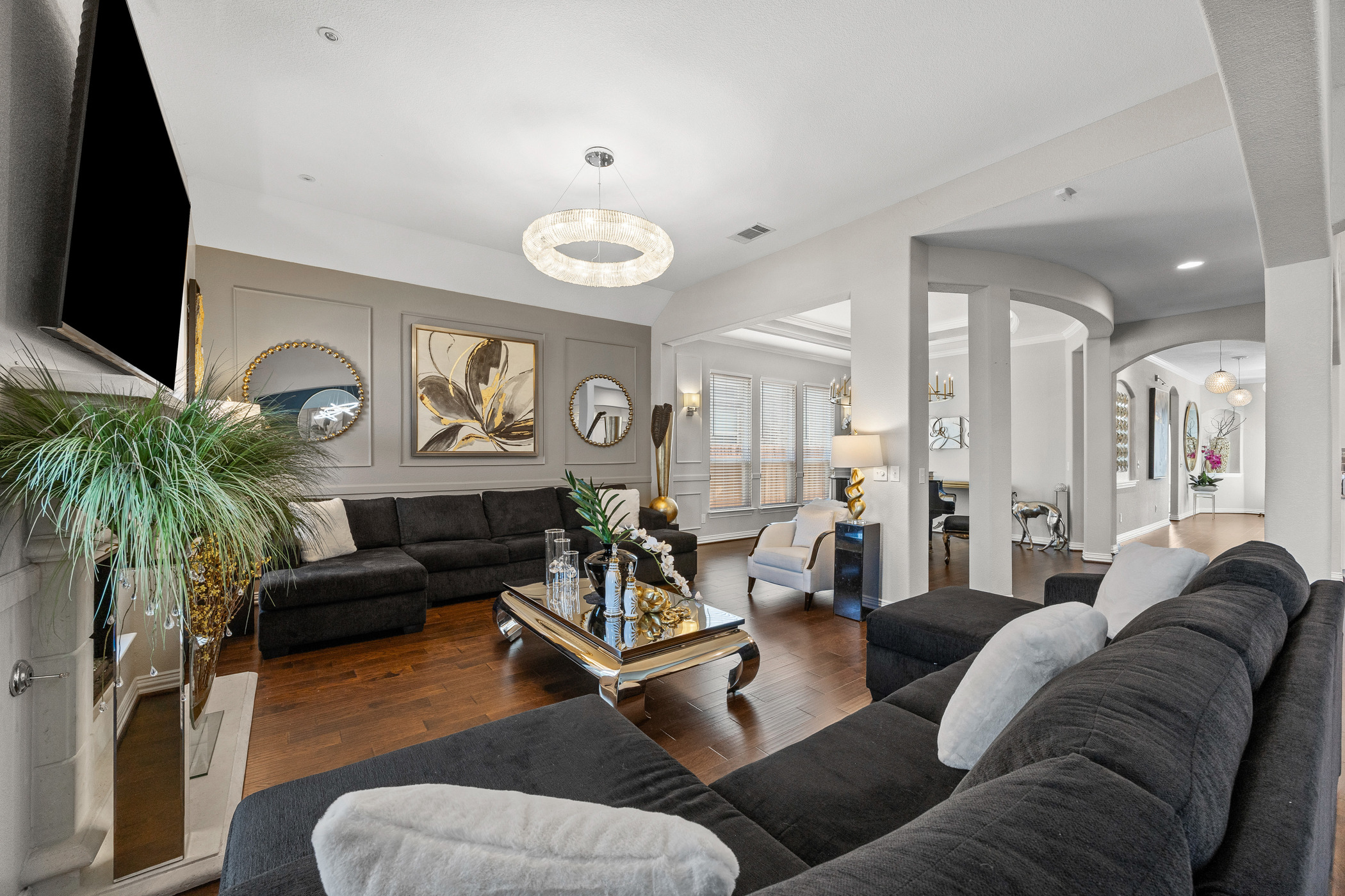 381 Betony Loop Buda, TX 78610 - Photo 11 of 32 a living room with furniture and a flat screen tv