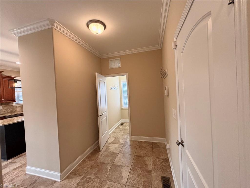 5019 Peppertree Road Clemmons, NC 27012 - Photo 16 of 21 Perfect for coats etc, next to garage entrance.