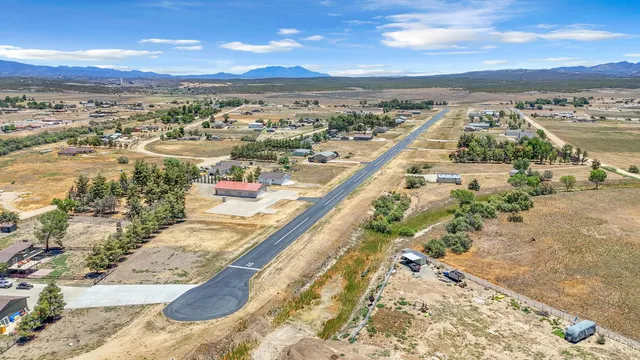 a view of a swimming pool with an ocean view