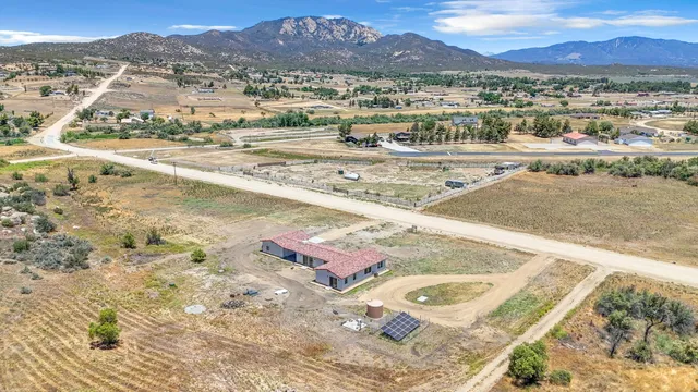 a view of a terrace with wooden floor and city view