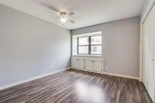 a view of a hallway with washer and dryer