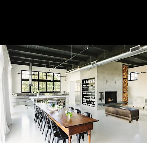 a outdoor dining space with furniture and a fireplace