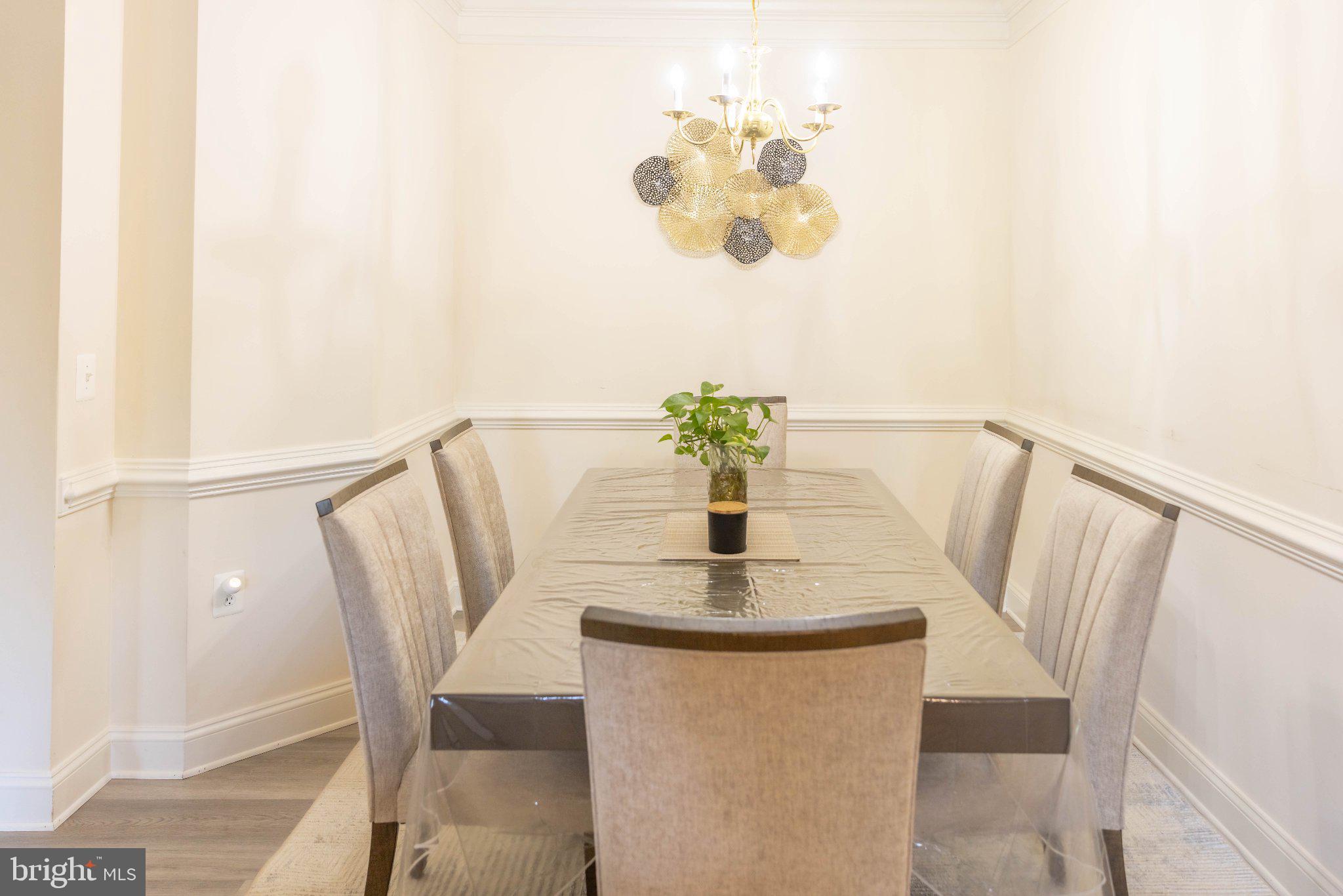 12824 Clarksburg Square Road, Unit 105 Clarksburg, MD 20871 - Photo 53 of 96 Elegant dining space with modern charm.