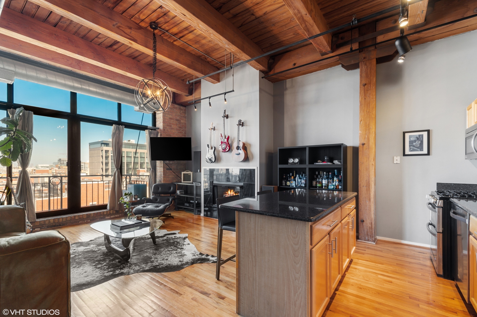 1250 West Van Buren Street, Unit 605 Chicago, IL 60607 - Photo 9 of 16 a very nice looking living room with a large window