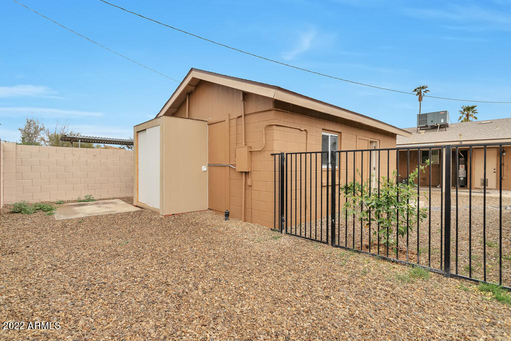 1638 East Granada Road, Unit B Phoenix, AZ 85006 - Photo 18 of 19 a view of a house with a yard