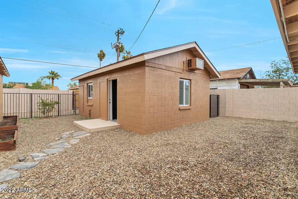 1638 East Granada Road, Unit B Phoenix, AZ 85006 - Photo 19 of 19 a view of a house with a backyard