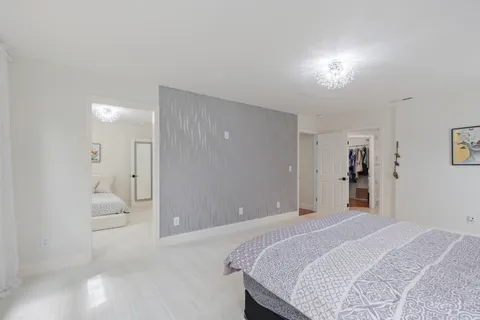 a room with furniture and a large window