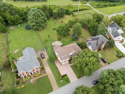an aerial view of a city with lots of residential buildings