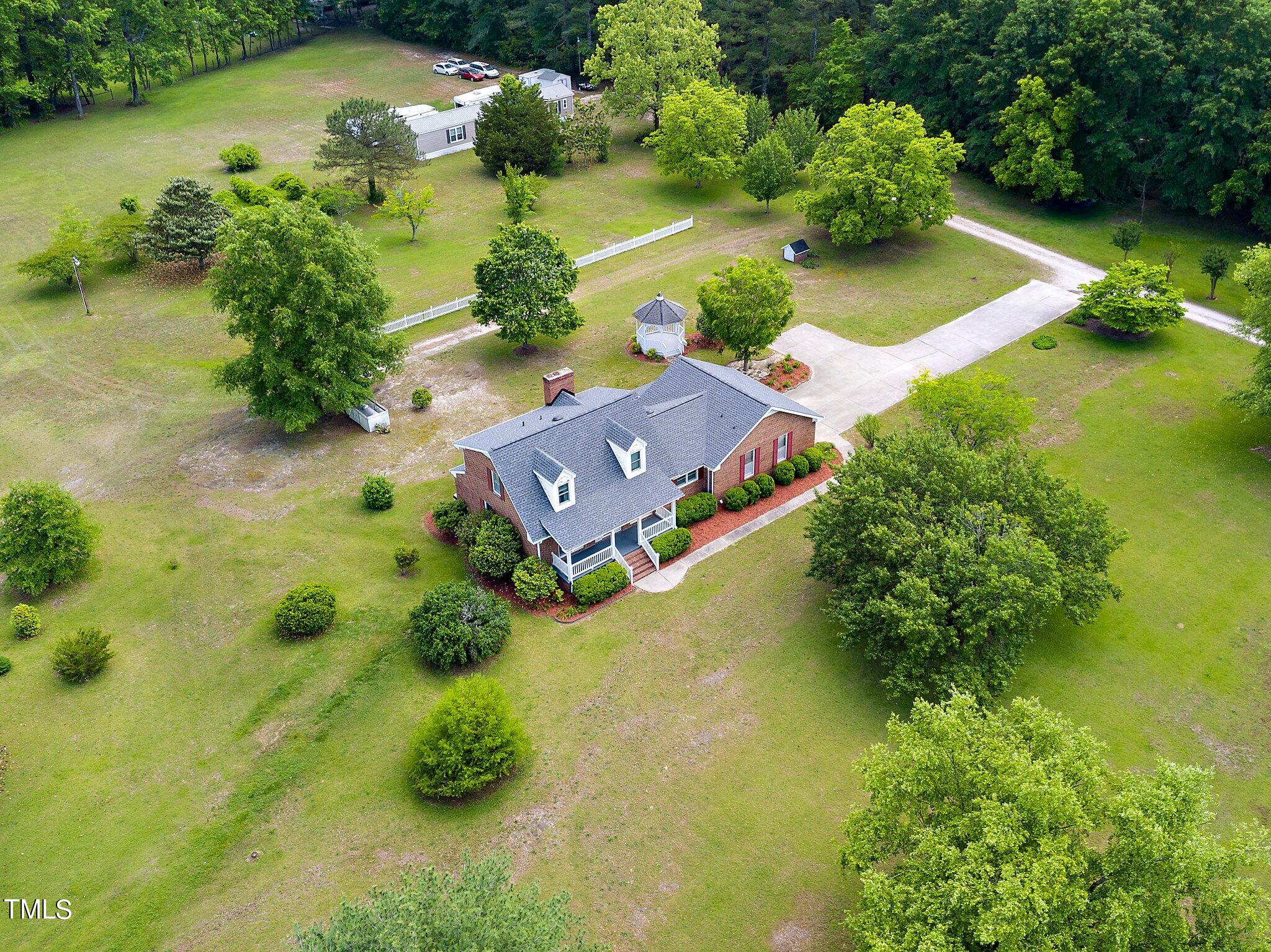 10213 Jordan Road Raleigh, NC 27603 - Photo 60 of 62 an aerial view of a house with a yard