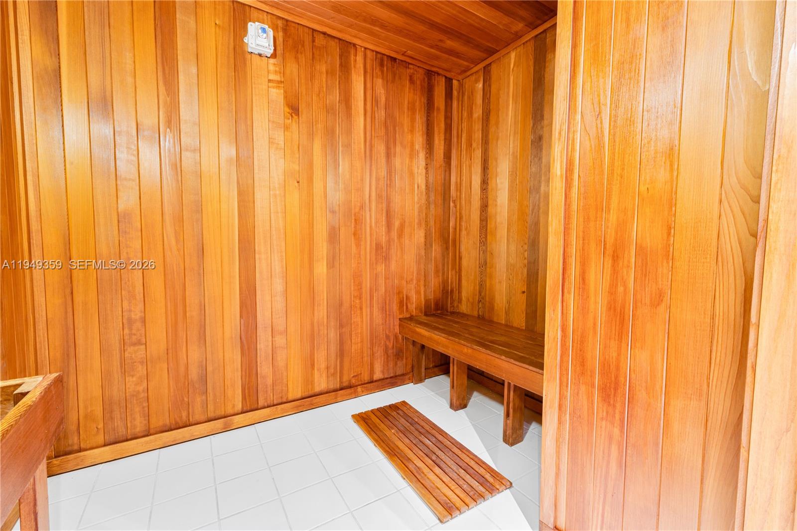 3801 Collins Avenue, Unit 1105 Miami Beach, FL 33140 - Photo 37 of 44 a view of wooden balcony with furniture and a window