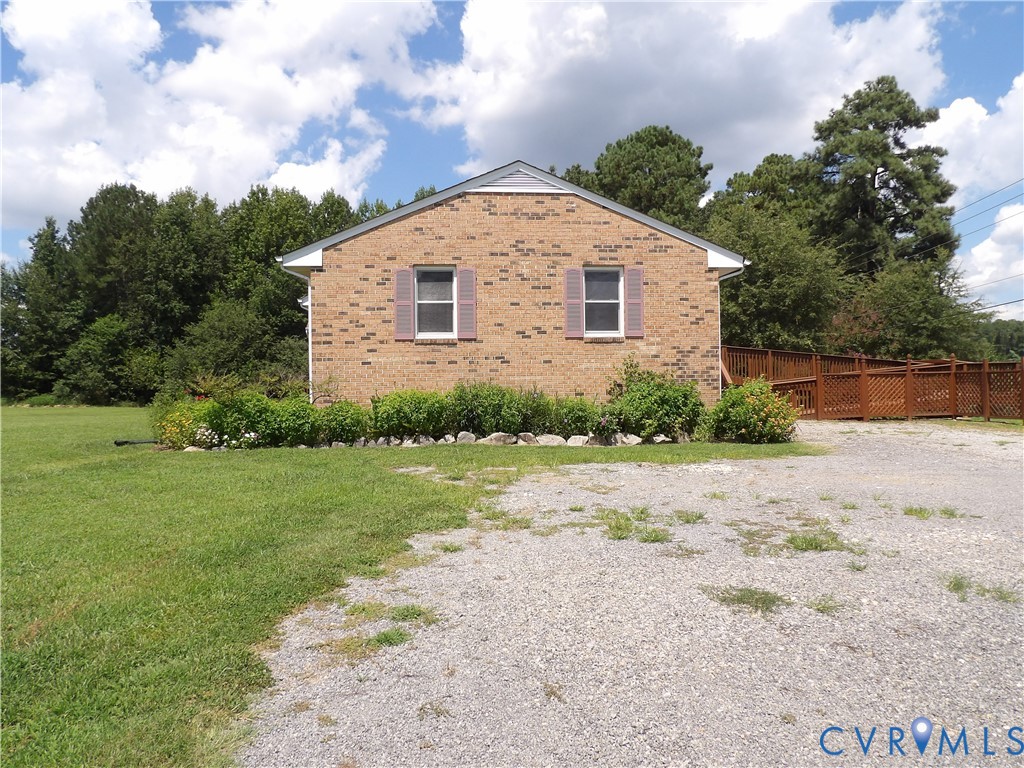 3813 Johnson Road Petersburg, VA 23805 - Photo 6 of 51 Brick exterior with two windows featuring decorati