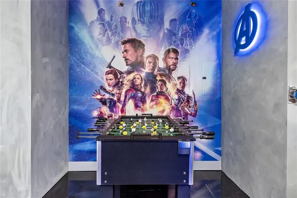 a bedroom with a bed and flat screen tv