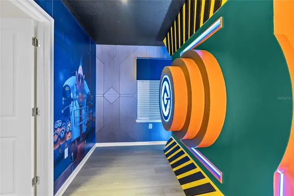 a bedroom with a bed and flat screen tv