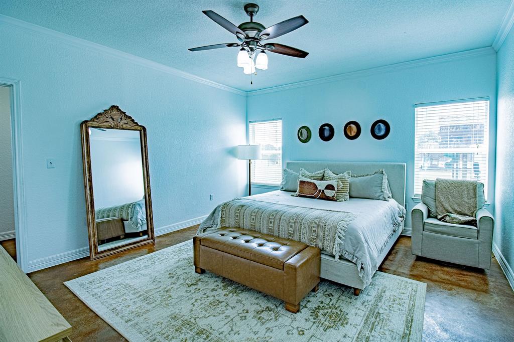 328 Meadow Lane Red Oak, TX 75154 - Photo 14 of 35 Bedroom with crown molding, a textured ceiling, a ceiling fan, and a textured wall