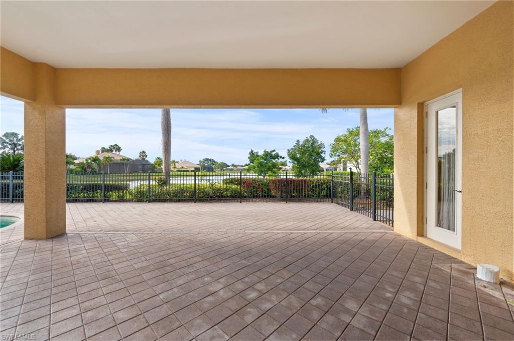 527 Terracina Way Naples, FL 34119 - Photo 41 of 48 a view of an outdoor space and a lake view