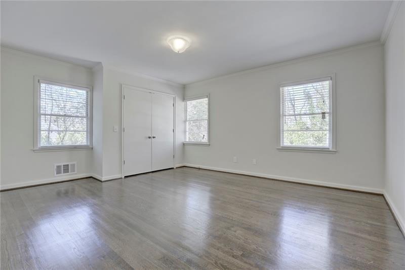 1195 Mt Paran Road Northwest Atlanta, GA 30327 - Photo 11 of 24 an empty room with wooden floor and windows