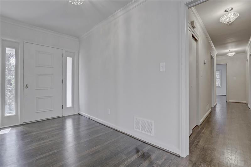 1195 Mt Paran Road Northwest Atlanta, GA 30327 - Photo 2 of 24 a view of a hallway with wooden floor