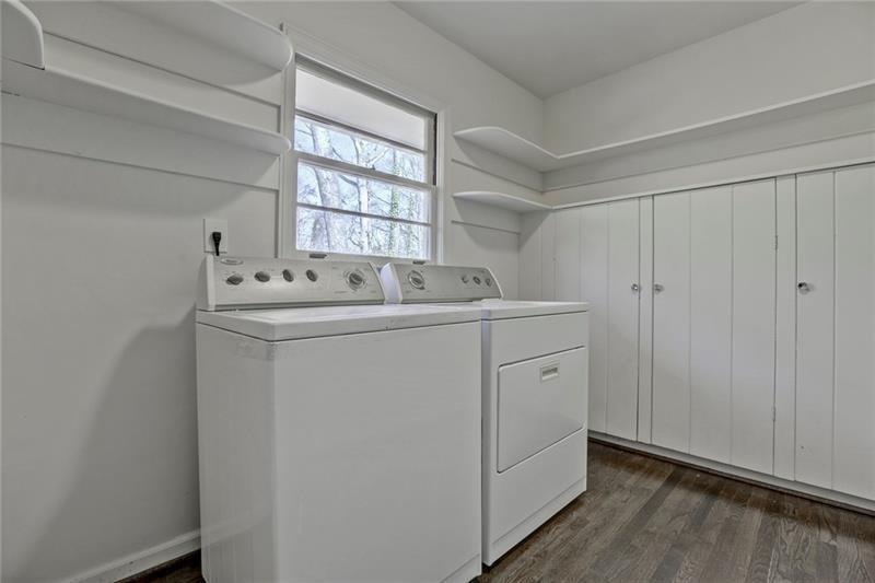 1195 Mt Paran Road Northwest Atlanta, GA 30327 - Photo 21 of 24 a utility room with closet dryer and washer