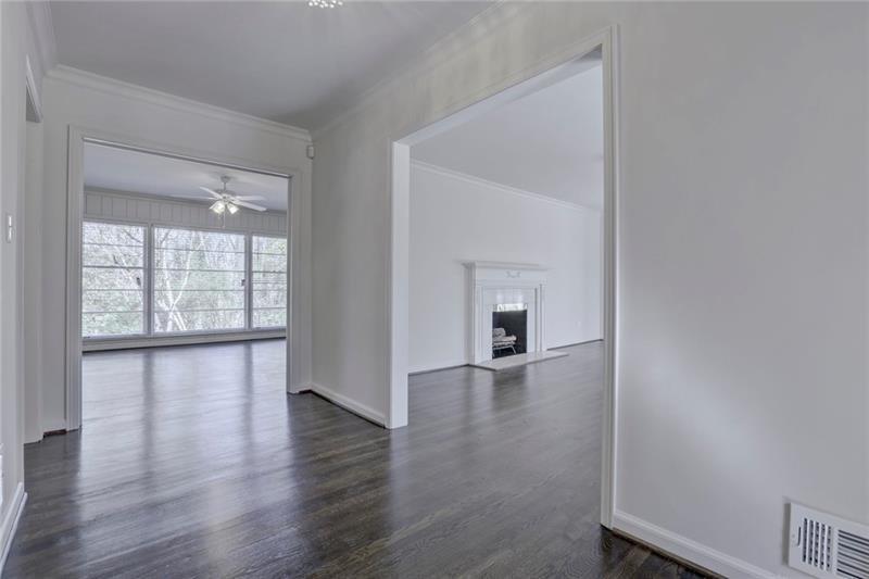 1195 Mt Paran Road Northwest Atlanta, GA 30327 - Photo 3 of 24 a view of an empty room with wooden floor and a window