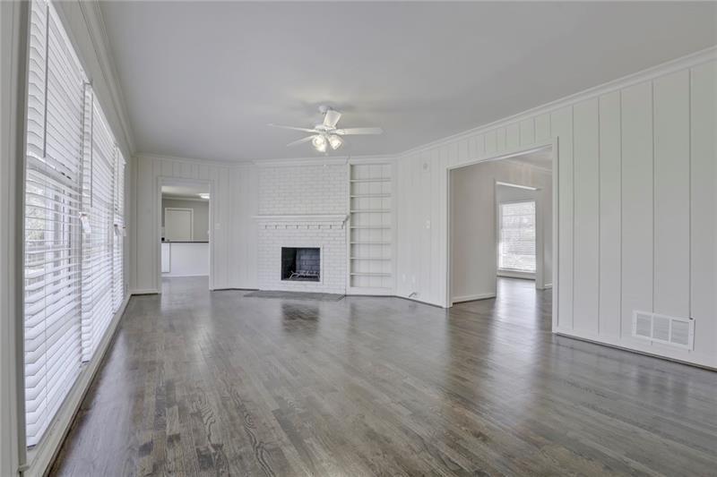 1195 Mt Paran Road Northwest Atlanta, GA 30327 - Photo 4 of 24 wooden floor in an empty room with a window