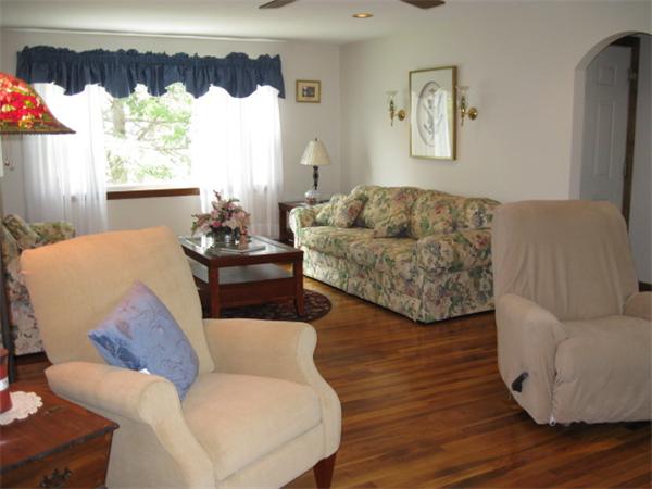 7 Gammons Road Acushnet, MA 02743 - Photo 11 of 20 a living room with furniture and a large window