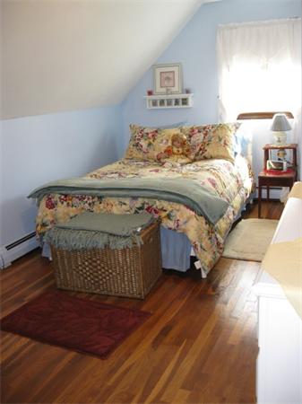 7 Gammons Road Acushnet, MA 02743 - Photo 17 of 20 a bedroom with a bed and a night stand