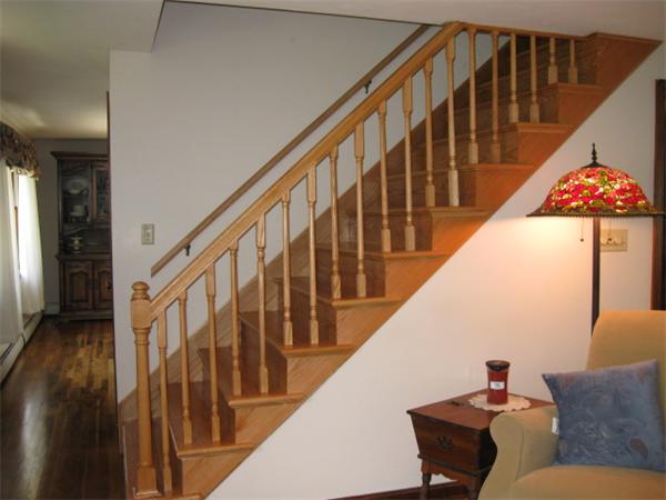 7 Gammons Road Acushnet, MA 02743 - Photo 19 of 20 a stair with table and chairs