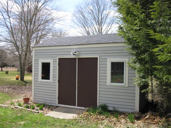 7 Gammons Road Acushnet, MA 02743 - Photo 6 of 20 a view of a house with a yard