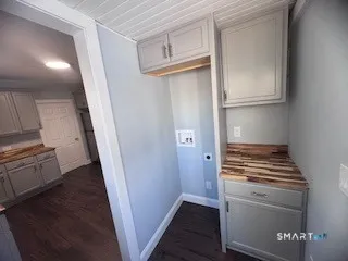 a view of kitchen and wooden floor