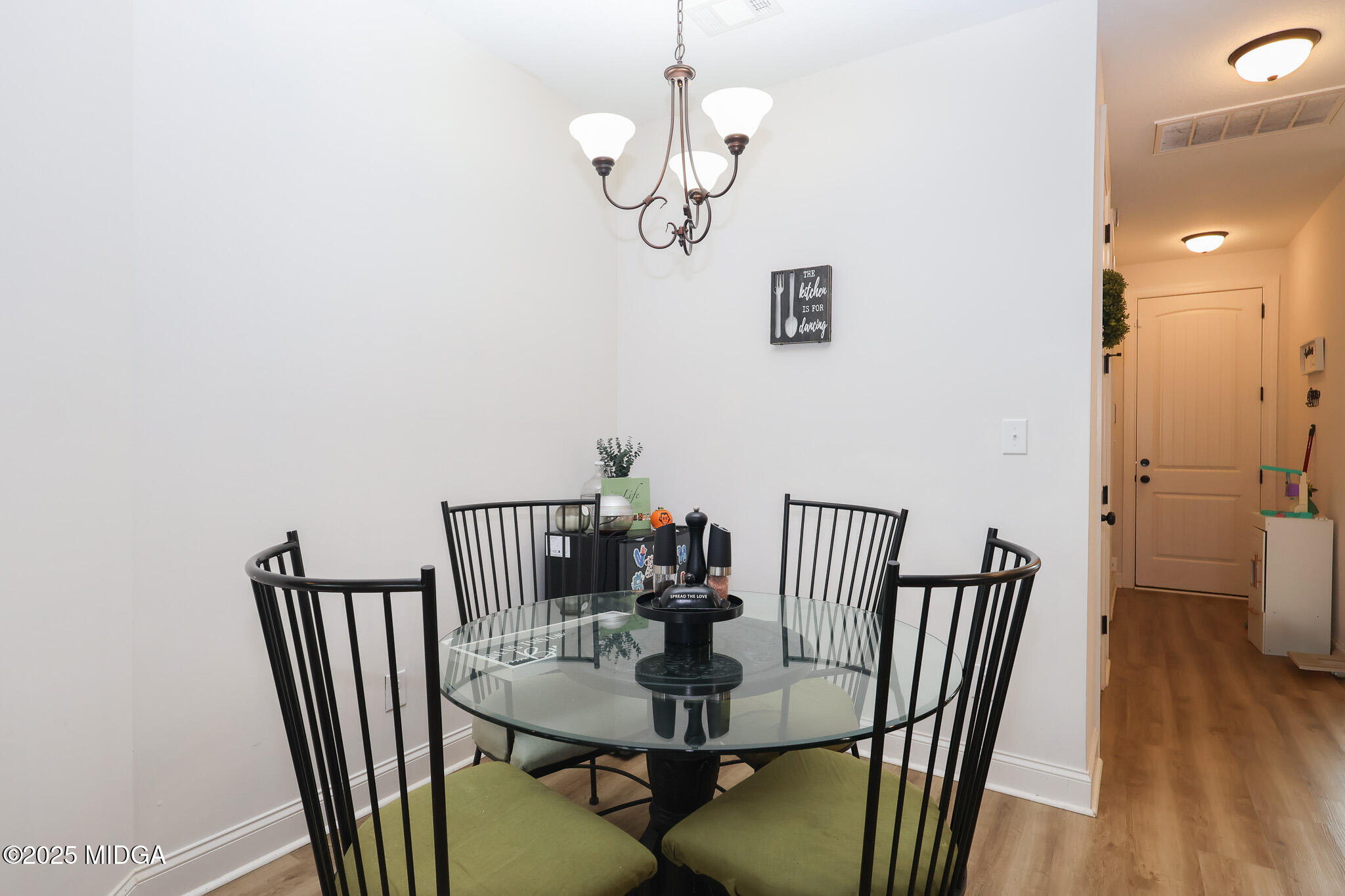 110 Gwendolyn Avenue Perry, GA 31069 - Photo 11 of 23 a view of a dining room with furniture wooden floor and fan