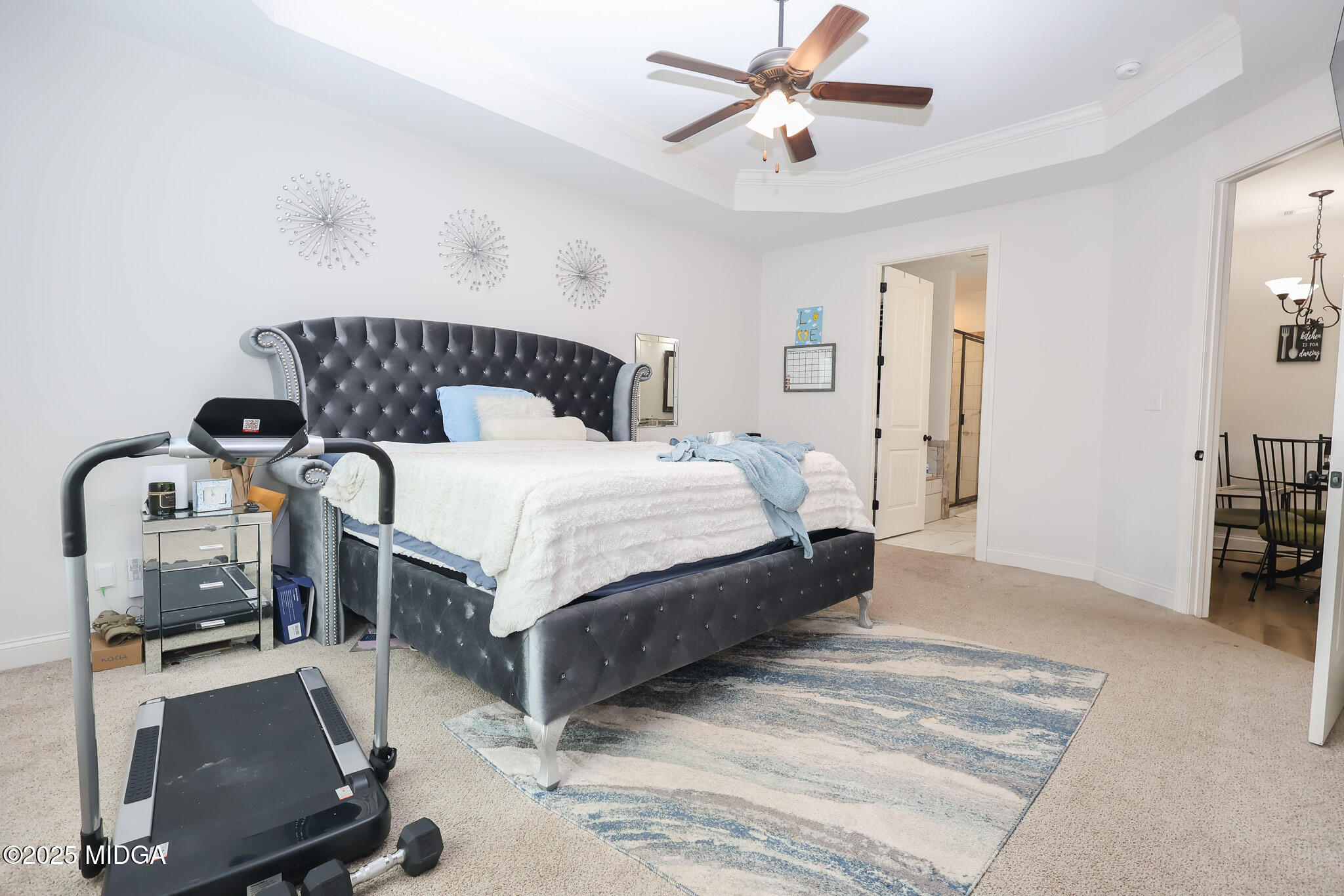 110 Gwendolyn Avenue Perry, GA 31069 - Photo 14 of 23 a bedroom with a bed and a chandelier