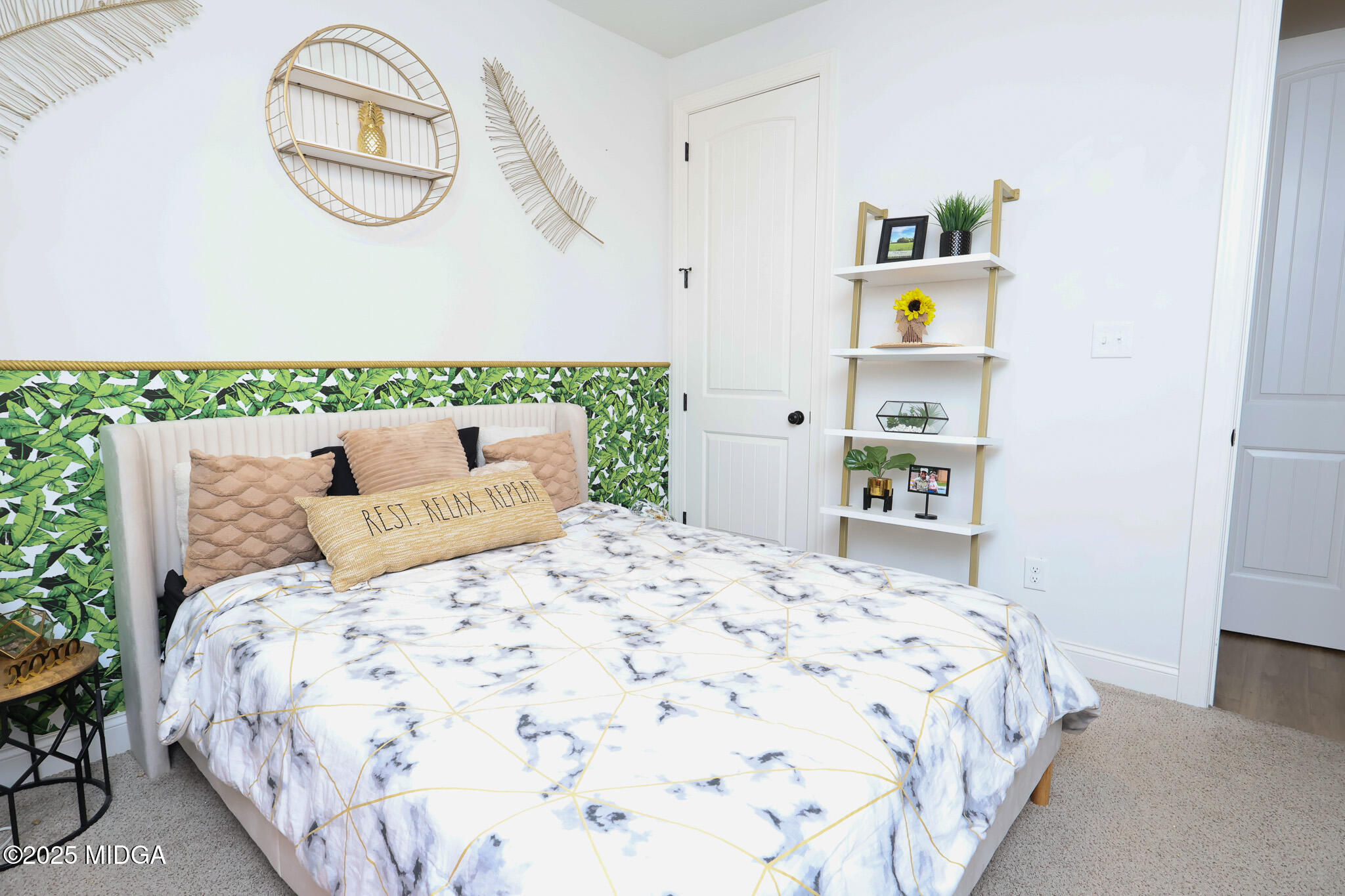 110 Gwendolyn Avenue Perry, GA 31069 - Photo 18 of 23 a bedroom with bed and flowerpot